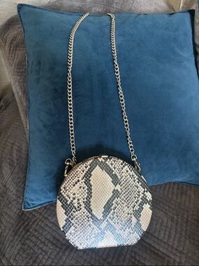 Round Snake-Print Crossbody Bag in Black and Cream